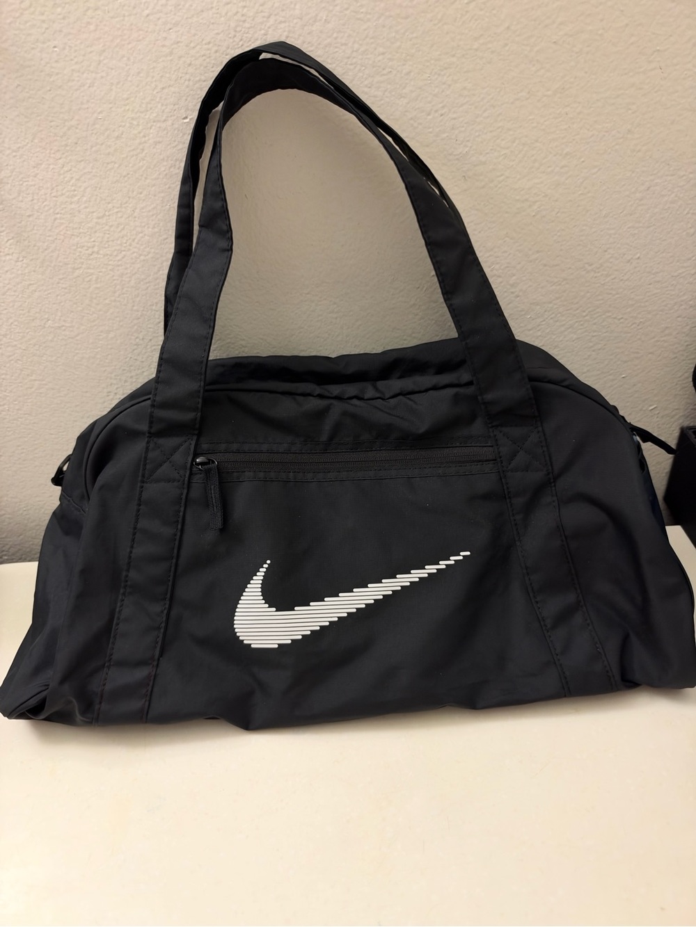 Nike Black Duffel Bag with White Swoosh Logo